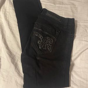 31 standard black rock revival skinnies